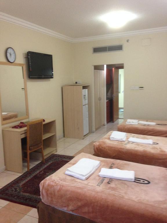 Cristalaat Al Aseel Hotel Мекка Номер фото